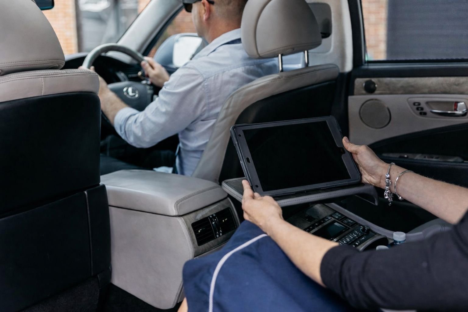 View from the back seat of the Lexus — premium airport transfer experience