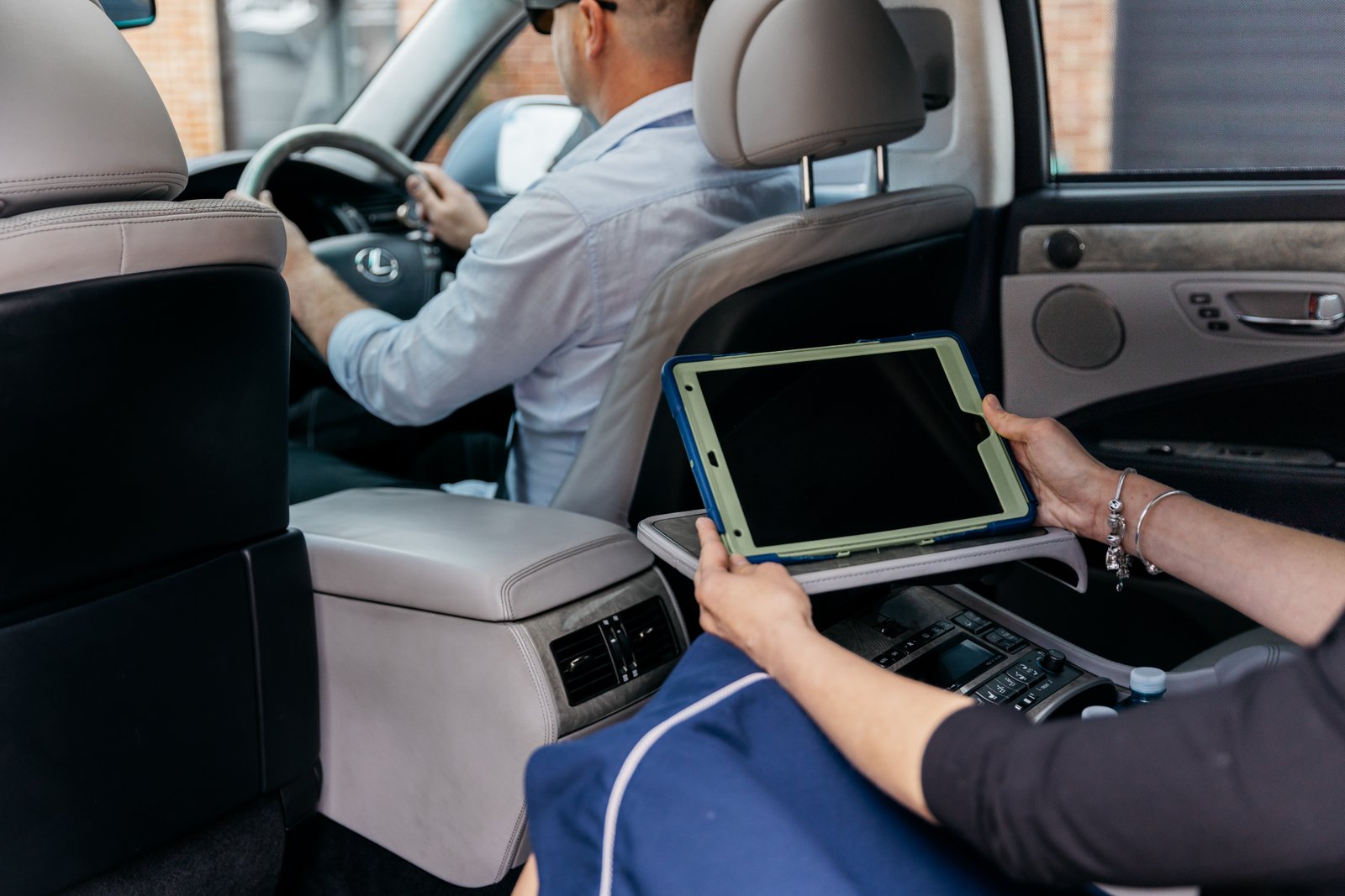 View from the back seat of the Lexus — premium airport transfer experience