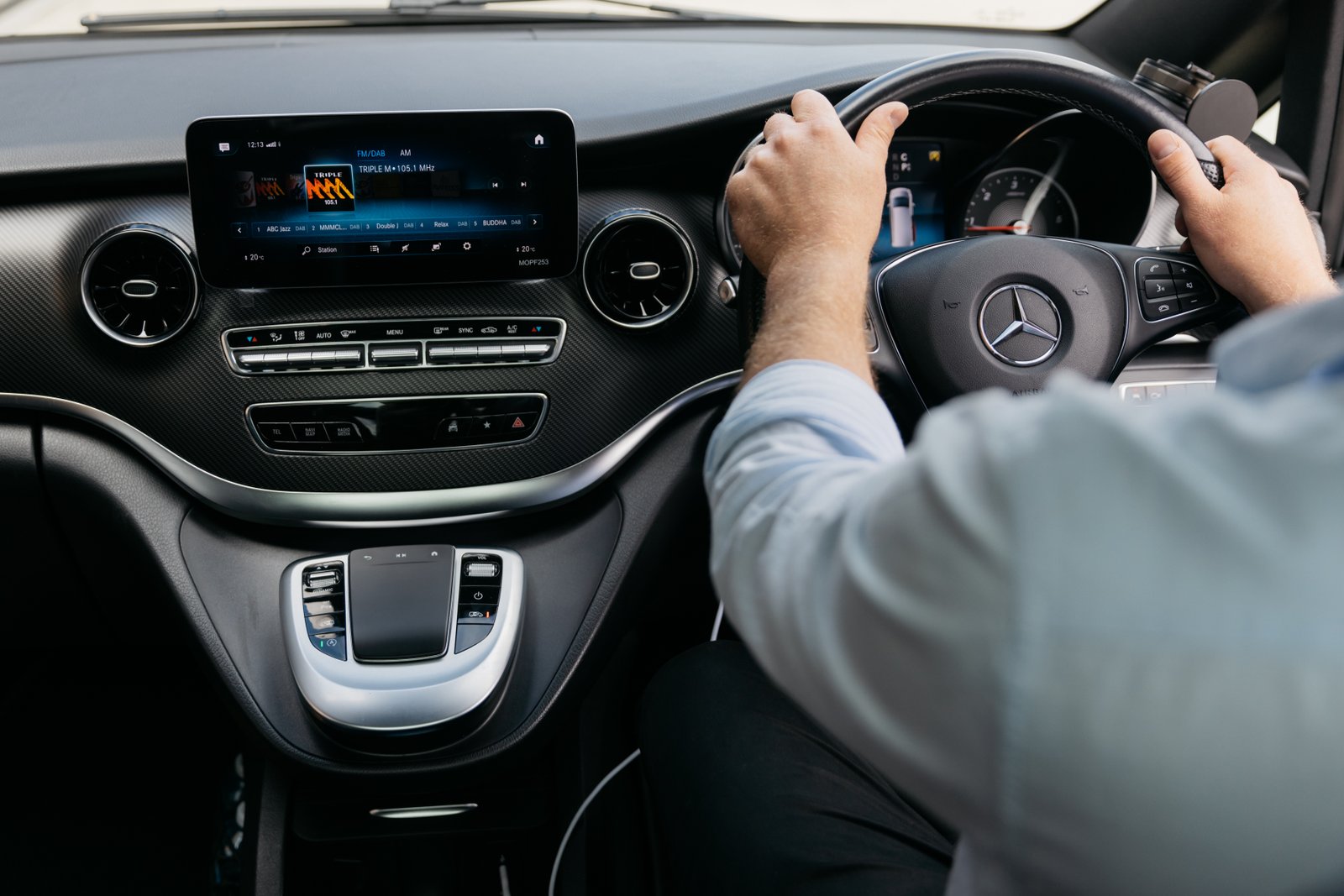 Professional chauffeur at the wheel — corporate transport